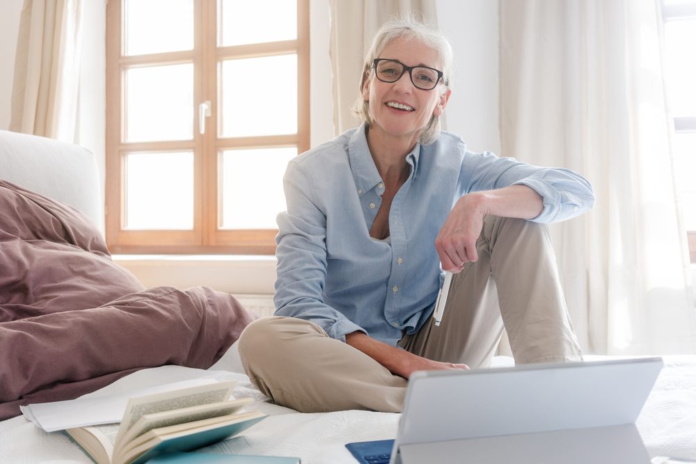 Self-employed professional learning QuickBooks Online on a laptop
